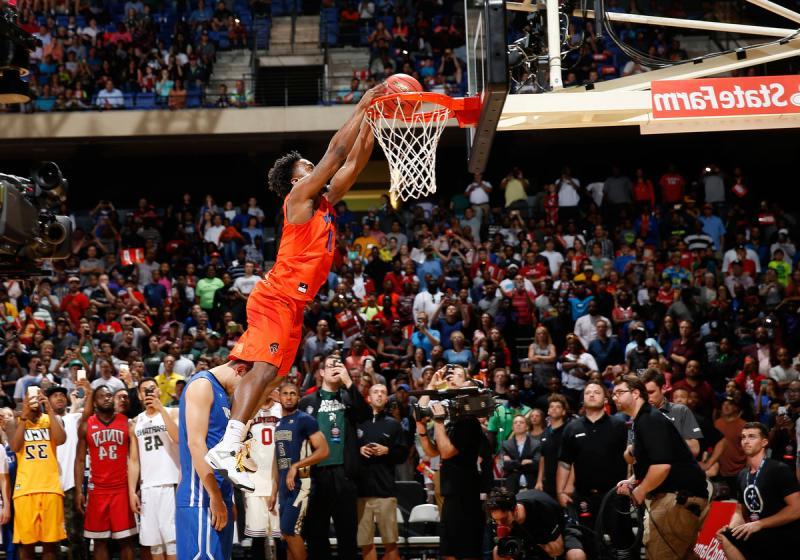 Devan Douglas Dunking a Basket